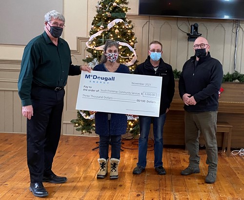 McDougall Energy donates $9,000 to Kingston Community Organizations 2 McDougall Energy Team Presents Cheque to SFCSC Executive Director, David Townsend