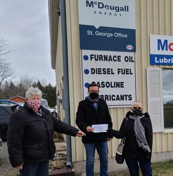 Local Organizations Receive $15,000 from McDougall Energy and Davis Fuels this Christmas (Burford/St. George) 2 timmargaretdebbie christmashampers
