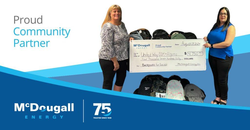 McDougall Energy Donates Backpacks to Local Students in Need 1 Photo of McDougall Energy representative with the United Way to present a donation cheque