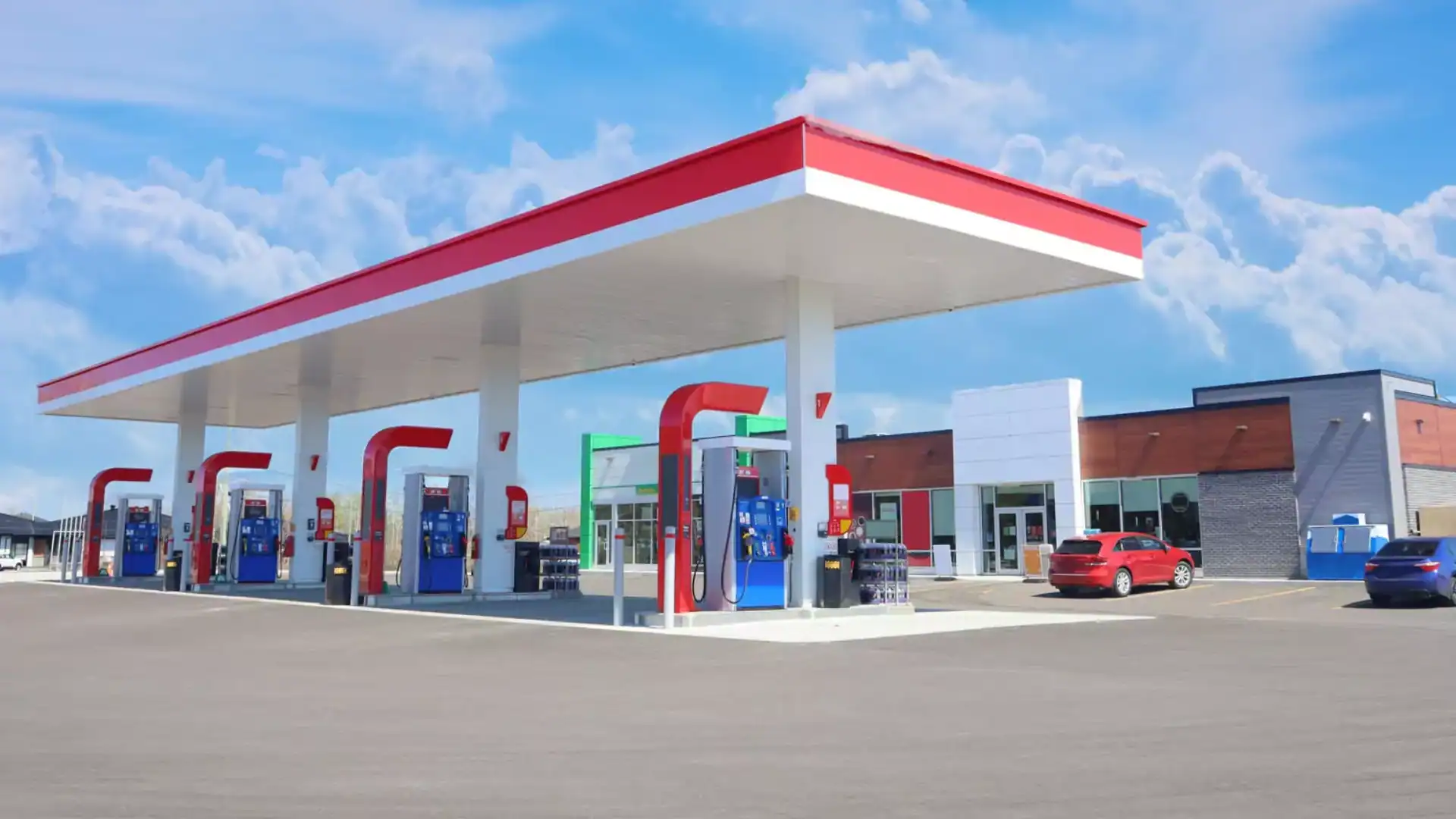 Convenient McDougall Energy gas station with multiple fuel pumps and modern facilities.