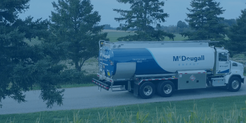 McDougall Energy Fuel Truck on Rural Road