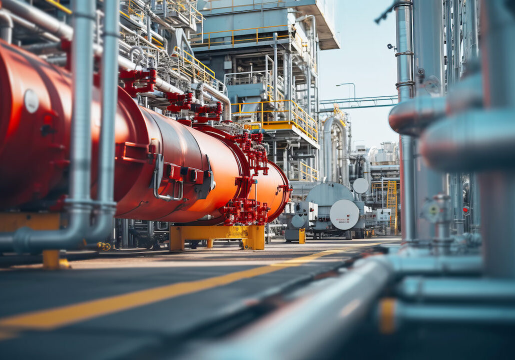 Pipeline and pipe rack of petroleum, chemical, hydrogen or ammonia industrial plant. Industrial zone Close up.