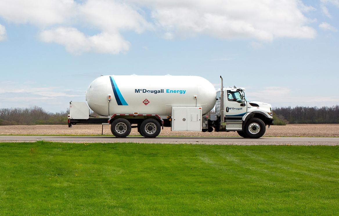 McDougall Truck delivering energy on grassy road